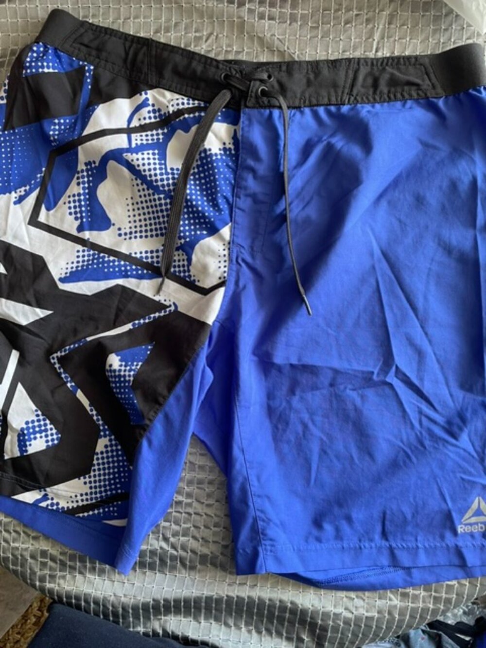 Reebok swimsuit no liner and one zipper pocket on right side size L